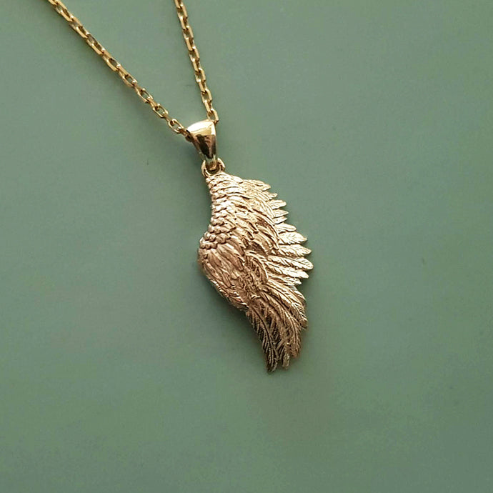 men's and women's angel wing pendant necklace in 14k and 18k gold