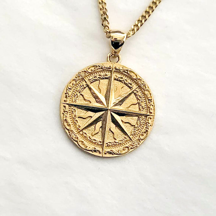 men's compass pendant necklace in 14k and 18k gold, with a circular shape