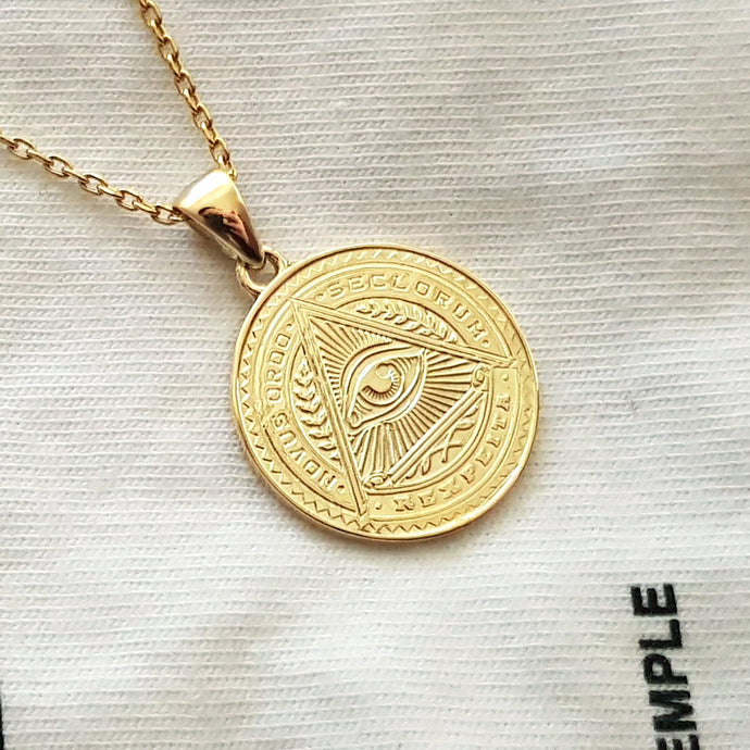 men's and women's eye of providence pendant necklace in 14k and 18k gold, with a circular shape