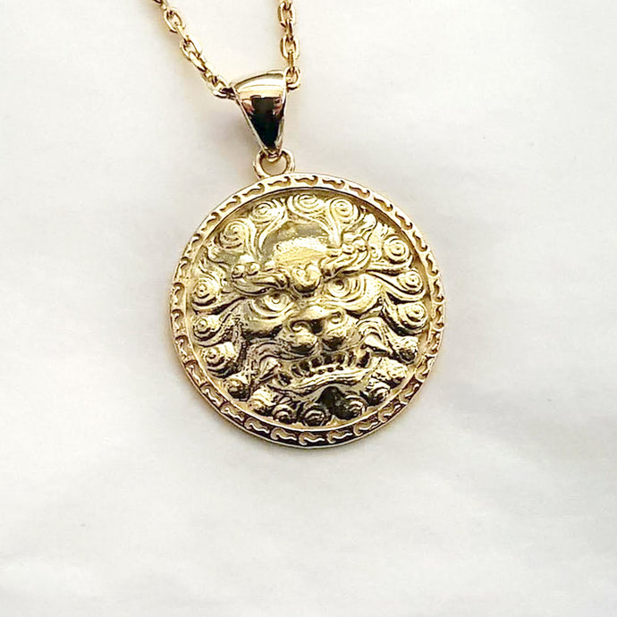 women's and men's Haetae Korean lion pendant necklace in 14k and 18k gold, with a circular shape