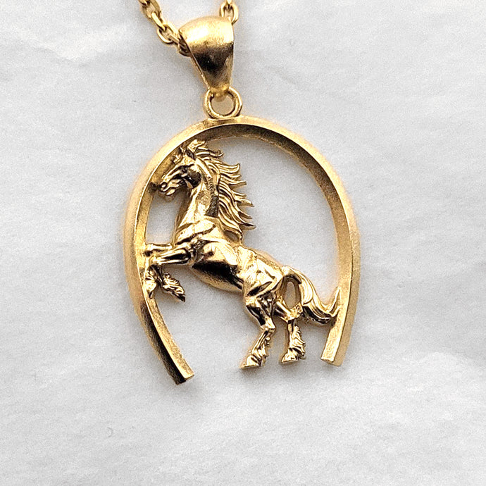Men's horse pendant necklace made in 14k and 18k gold, with a horse's hoof shape