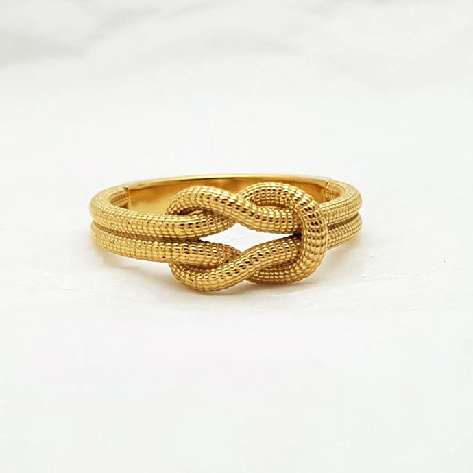 men's and women's knot ring in 14k and 18k gold