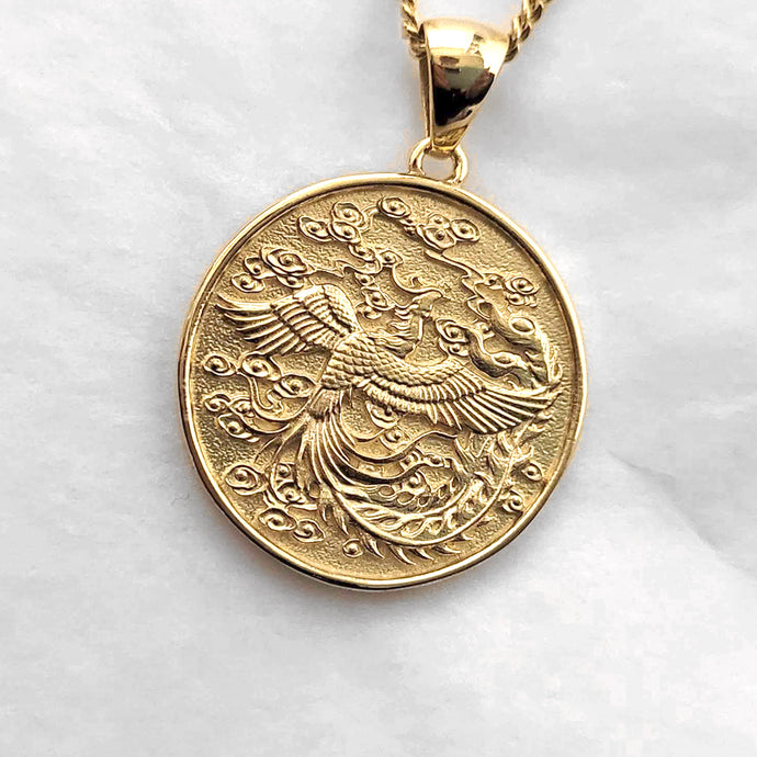 men's phoenix pendant necklace in 14k and 18k gold, with a circular shape